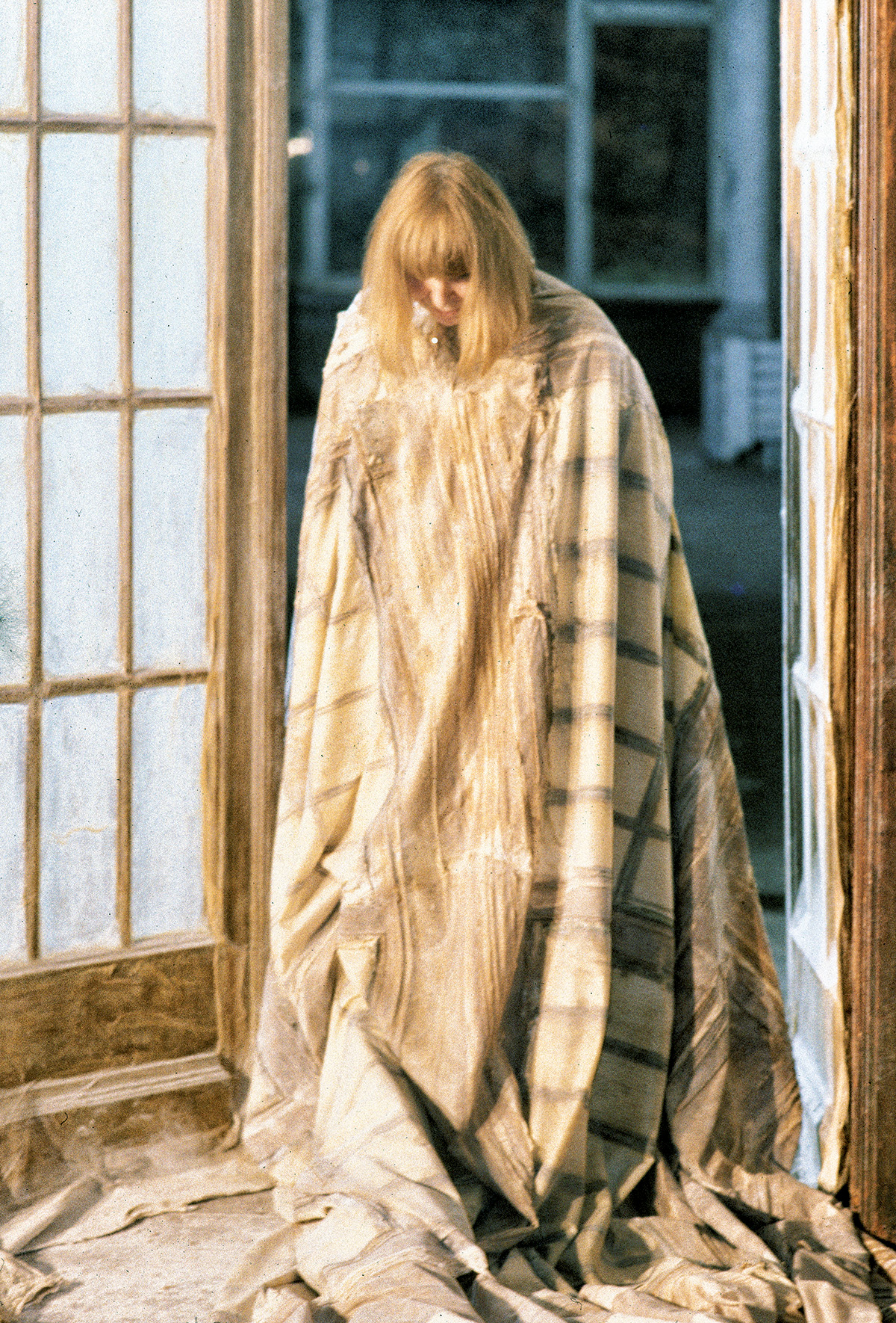 Heidi Bucher, wrapped in latex, during her skinning action for Small Glass Portal, 1988 Credit: The Estate of Heidi Bucher